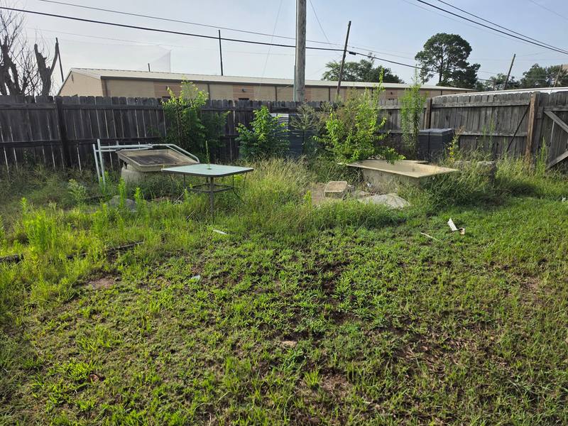 Cleanup site with grass and materials