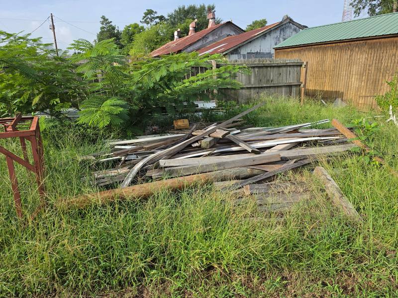 Stacked debris before cleanup