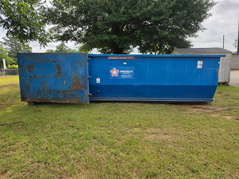 Republic Services dumpster at the cleanup site