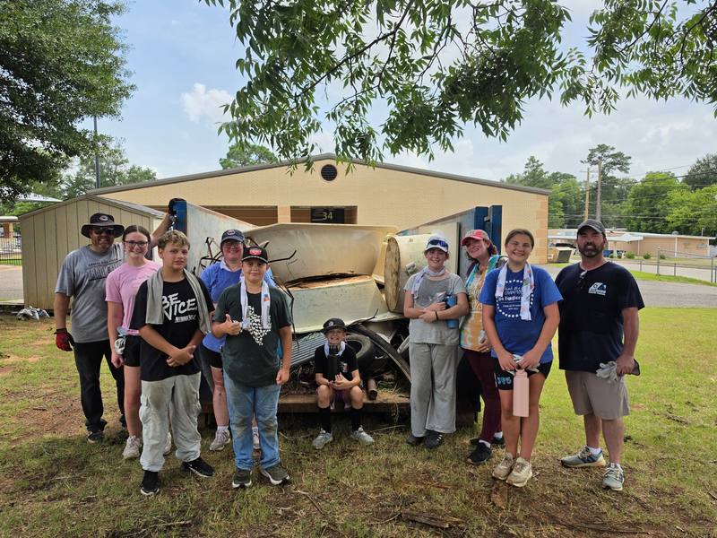Volunteer team group photo after cleanup work